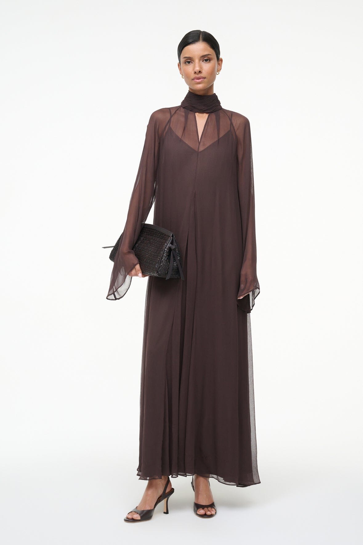 Brown maxi dress with high neck, sheer long sleeves, and V-neck front