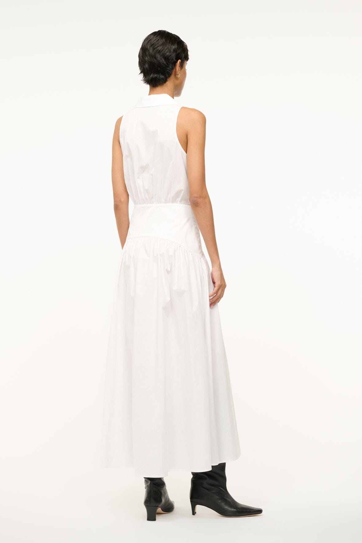 White sleeveless shirt dress, tiered skirt and gathered waist seam (back view)