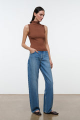 Brown sleeveless mock-neck knit top with ribbed texture, side view