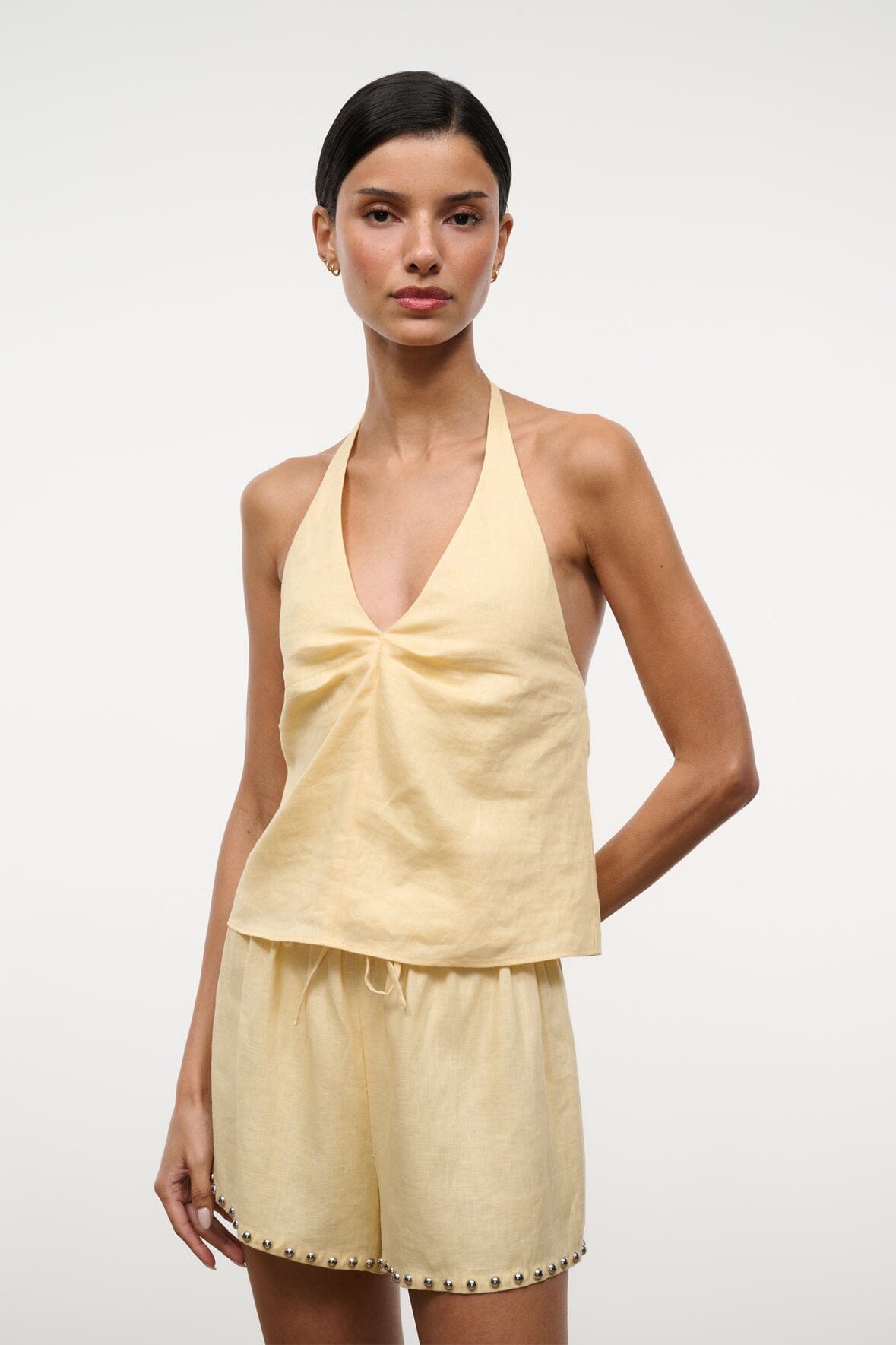 Butter linen halter top with V halter neckline and softly gathered hem