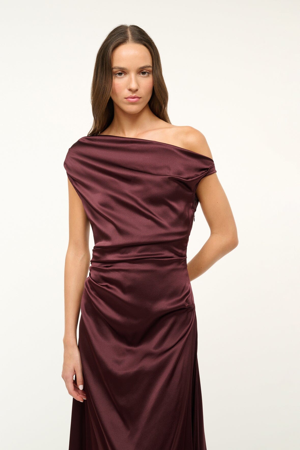 Merlot satin off-shoulder midi dress with draped neckline and side gathers.