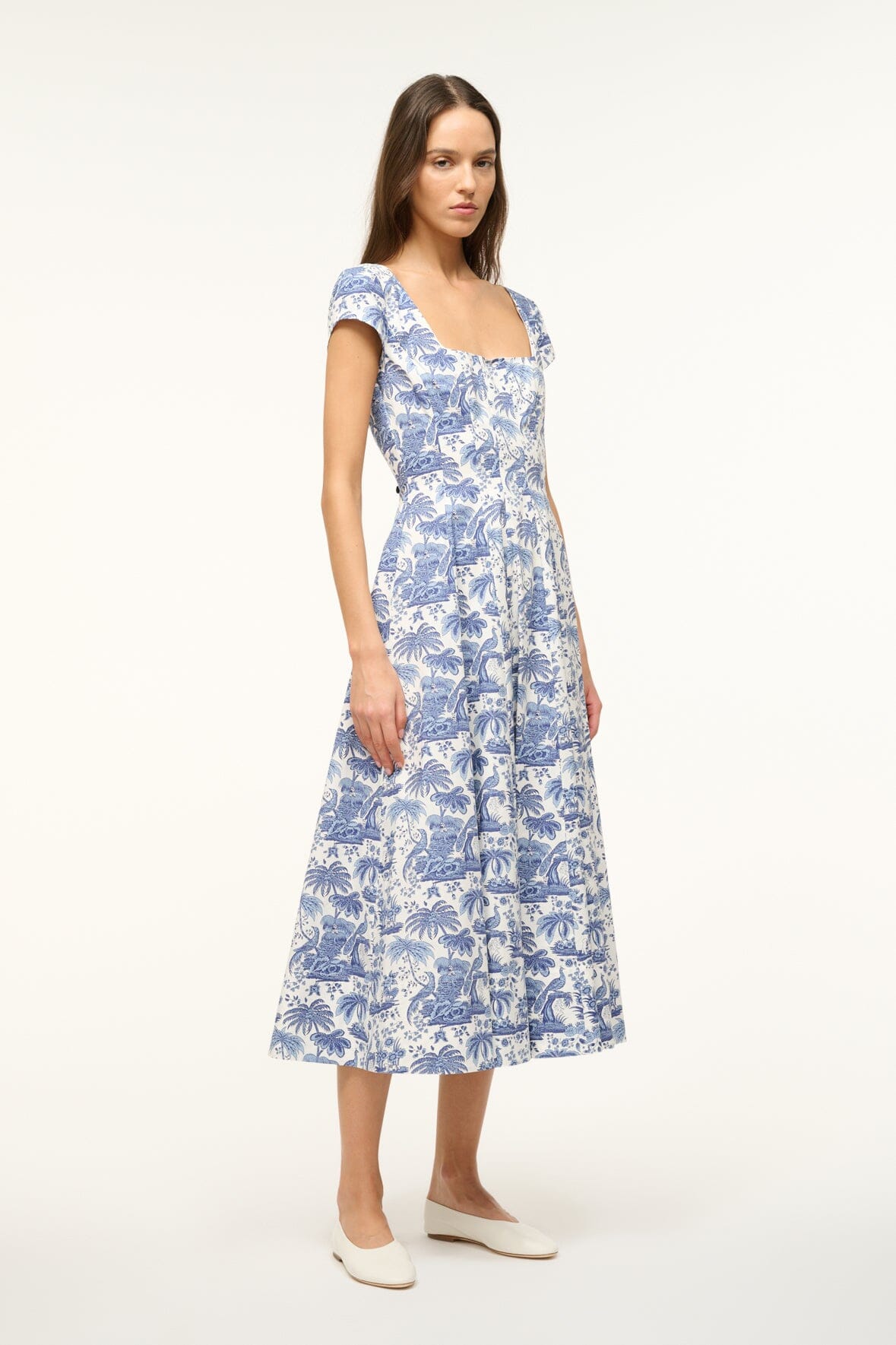 Blue toile short-sleeve dress with fitted waist and tiered midi skirt