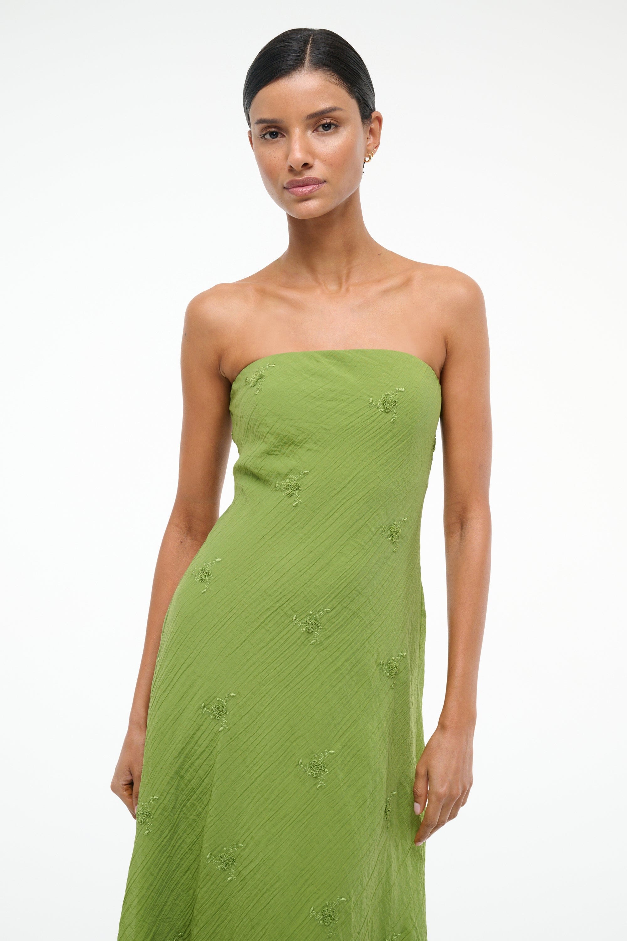 Garden green strapless maxi dress with textured fabric and subtle seam details