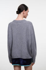 Ash gray cashmere relaxed crewneck sweater, back view, long sleeves