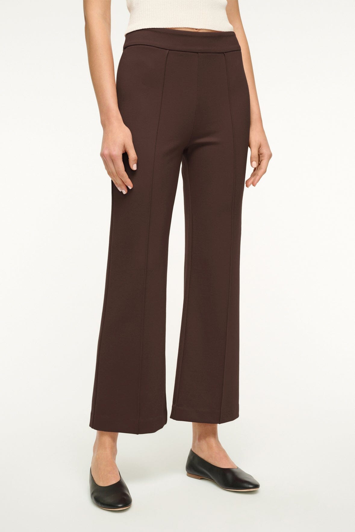 Women's dark chocolate brown wide-leg pants, front view with waistband and seam lines.