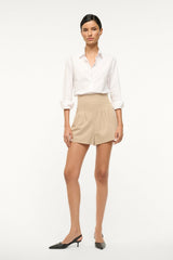Women’s stone-tan pleated shorts with straight waistband and cuffed hem