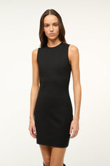 MERCER black sleeveless mini dress, crew neckline and fitted shift silhouette