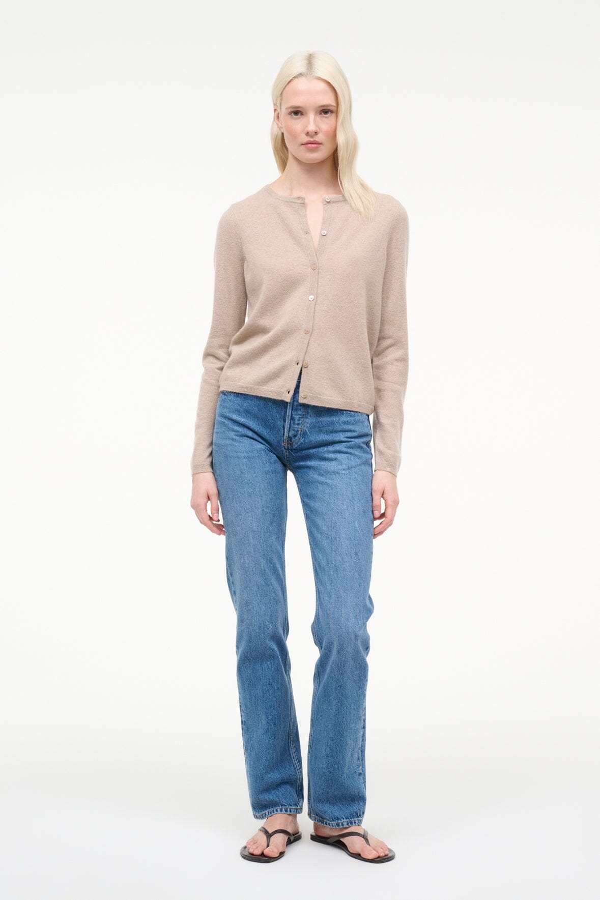 Stone cashmere cardigan worn with blue jeans