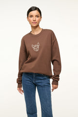 Brown oversized crewneck sweatshirt with small dog graphic front