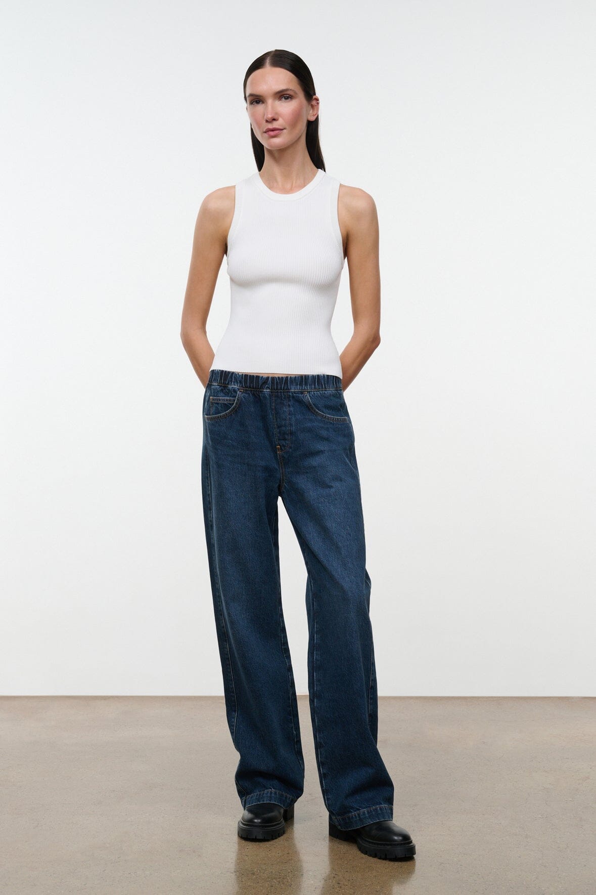White sleeveless crew-neck tank top, fitted rib knit