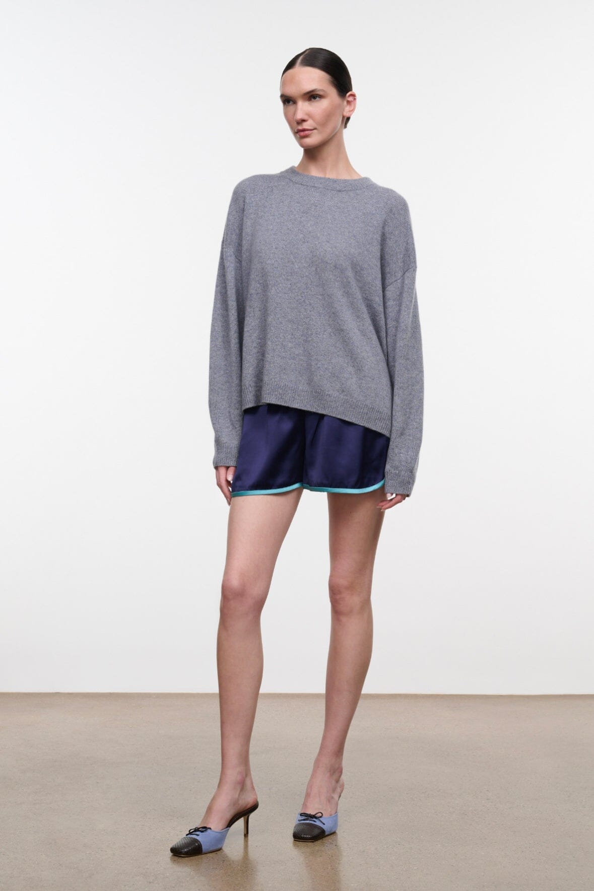 Ash gray cashmere relaxed crewneck sweater with wide long sleeves and ribbed hem