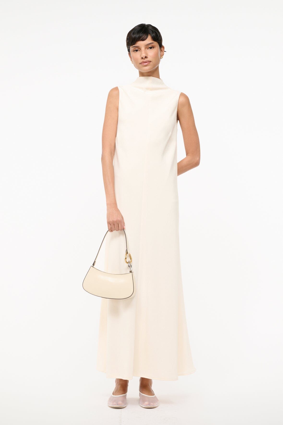 Ivory sleeveless turtleneck midi dress with side slit
