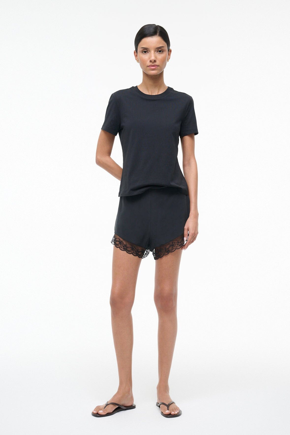 Black silk short with lace-trim hem, relaxed fit