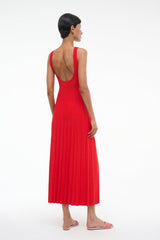 Red sleeveless pleated midi dress with low scoop back and fitted bodice