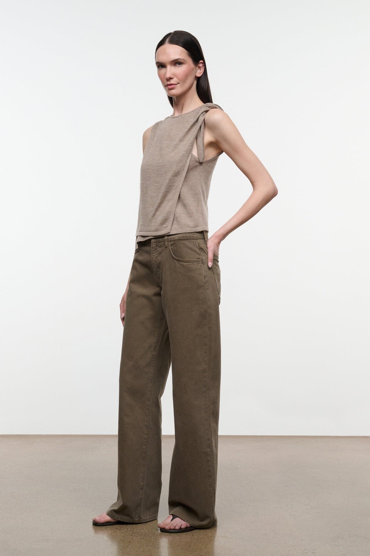 Sleeveless draped top in sesame beige with tied shoulder detail