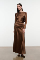 Brown silk dress with long sleeves, crew neckline, ruched waist and full midi skirt