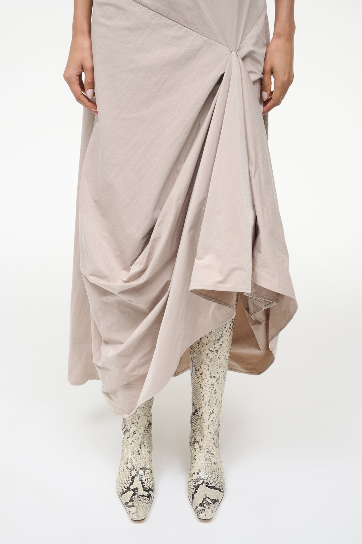 Knee-high snake-print boots with pointed toe and slim heel