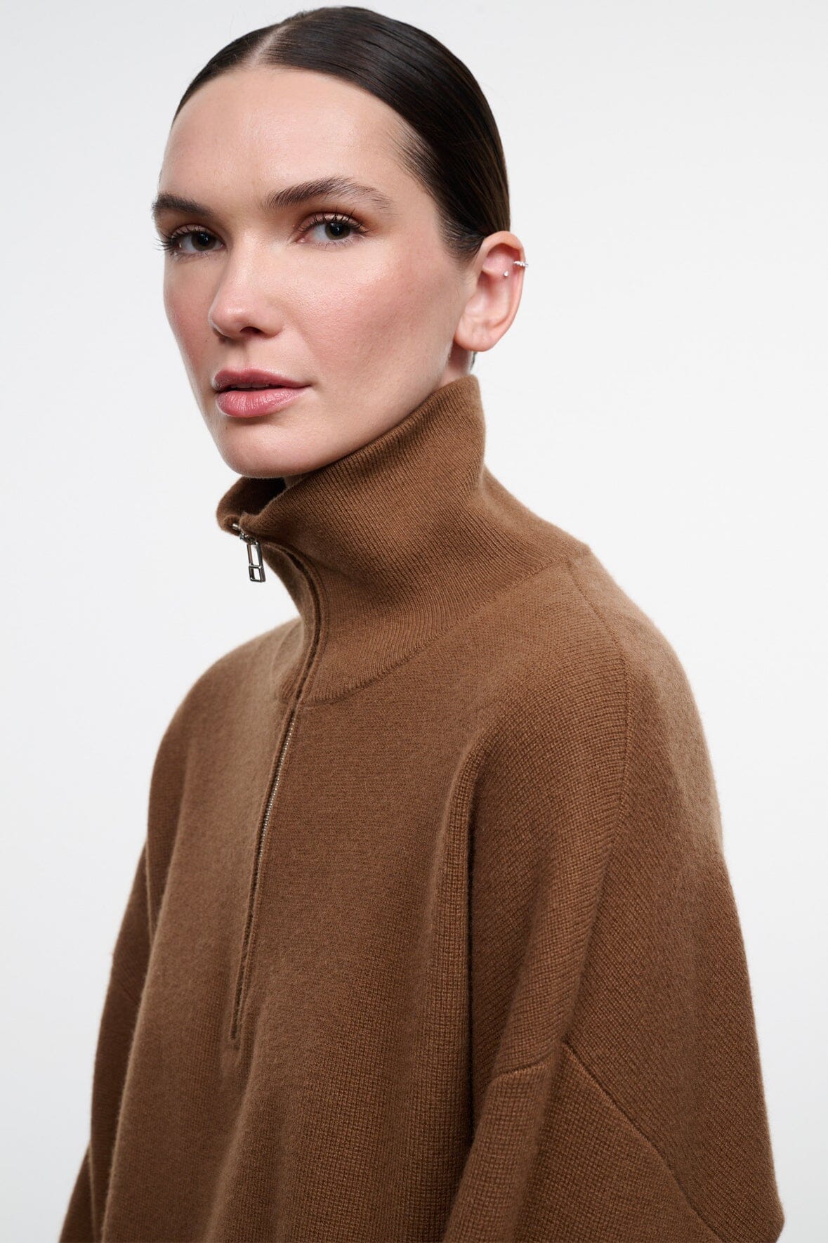 Cashmere sweater in cigar brown close-up of high collar zipper