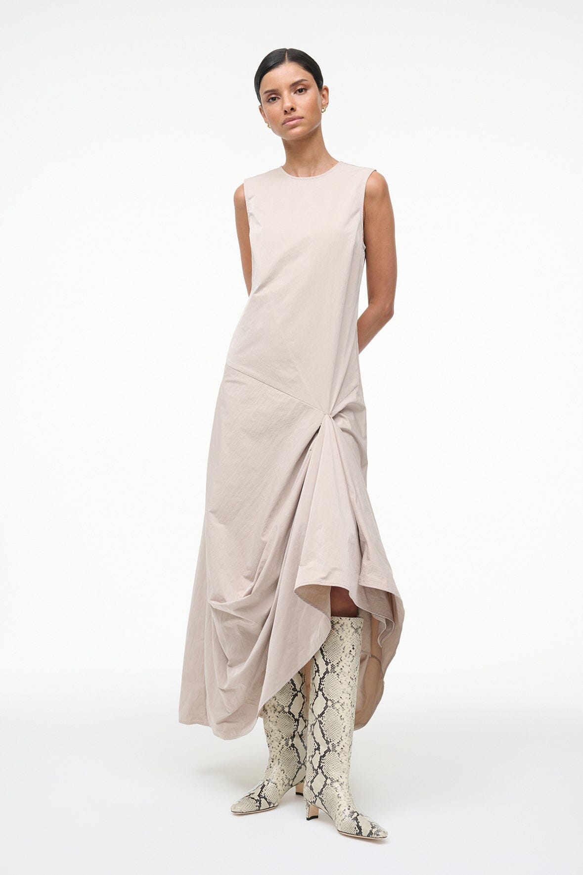 Knee-high snake-print boots with pointed toe and slim heel, side view