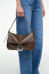 Truffle brown medium shoulder bag with flap, silver-tone horseshoe clasp, side tassel ties