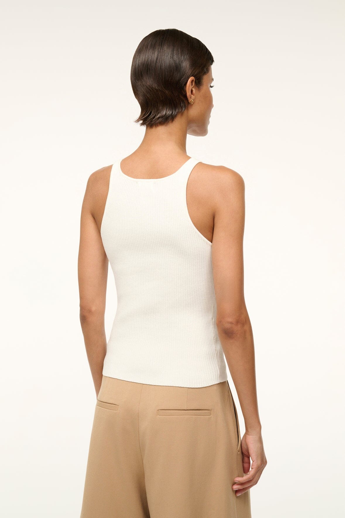 Women’s white sleeveless tank top with racerback and scoop neckline