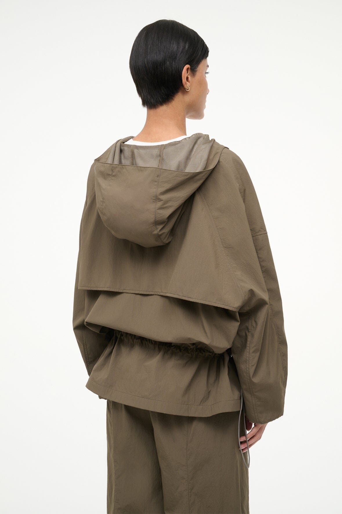 Hooded utility jacket in truffle brown, back view with adjustable waist drawstring