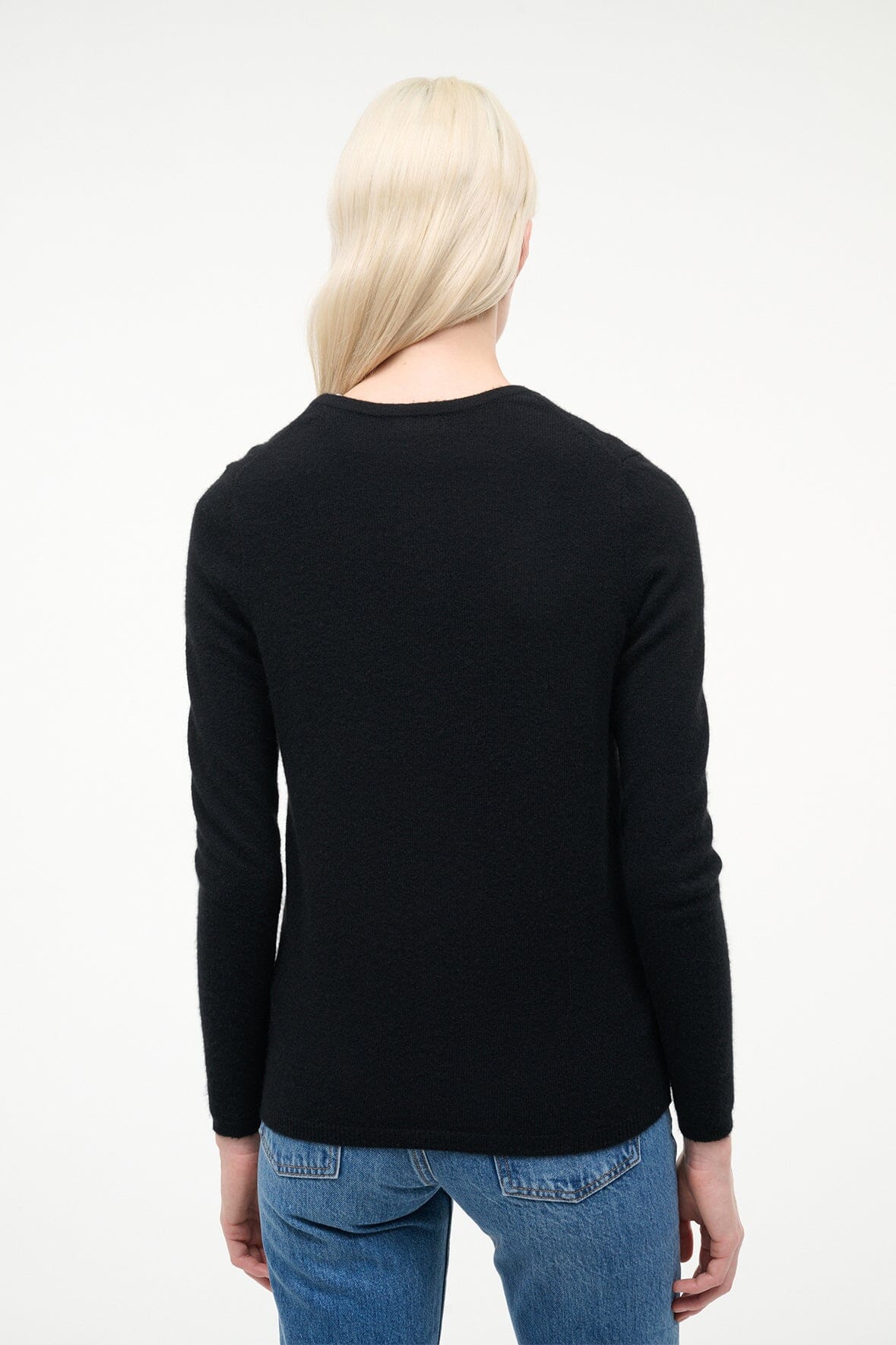 Black cashmere cardigan, back view with button detailing and long sleeves