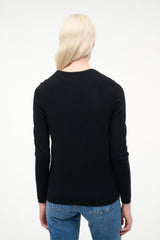 Black cashmere cardigan, back view with button detailing and long sleeves