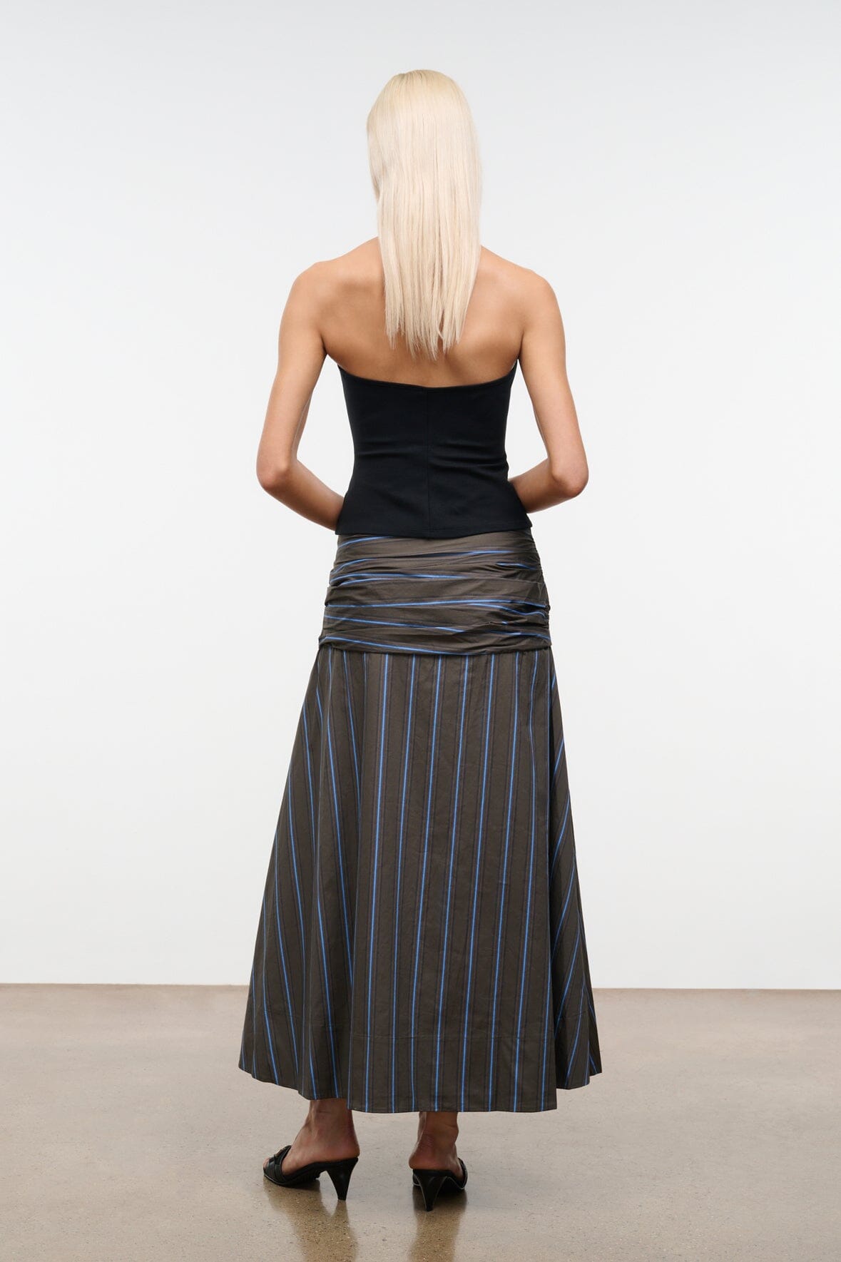 SOL striped midi skirt back view with gathered waistband and blue stripe detail