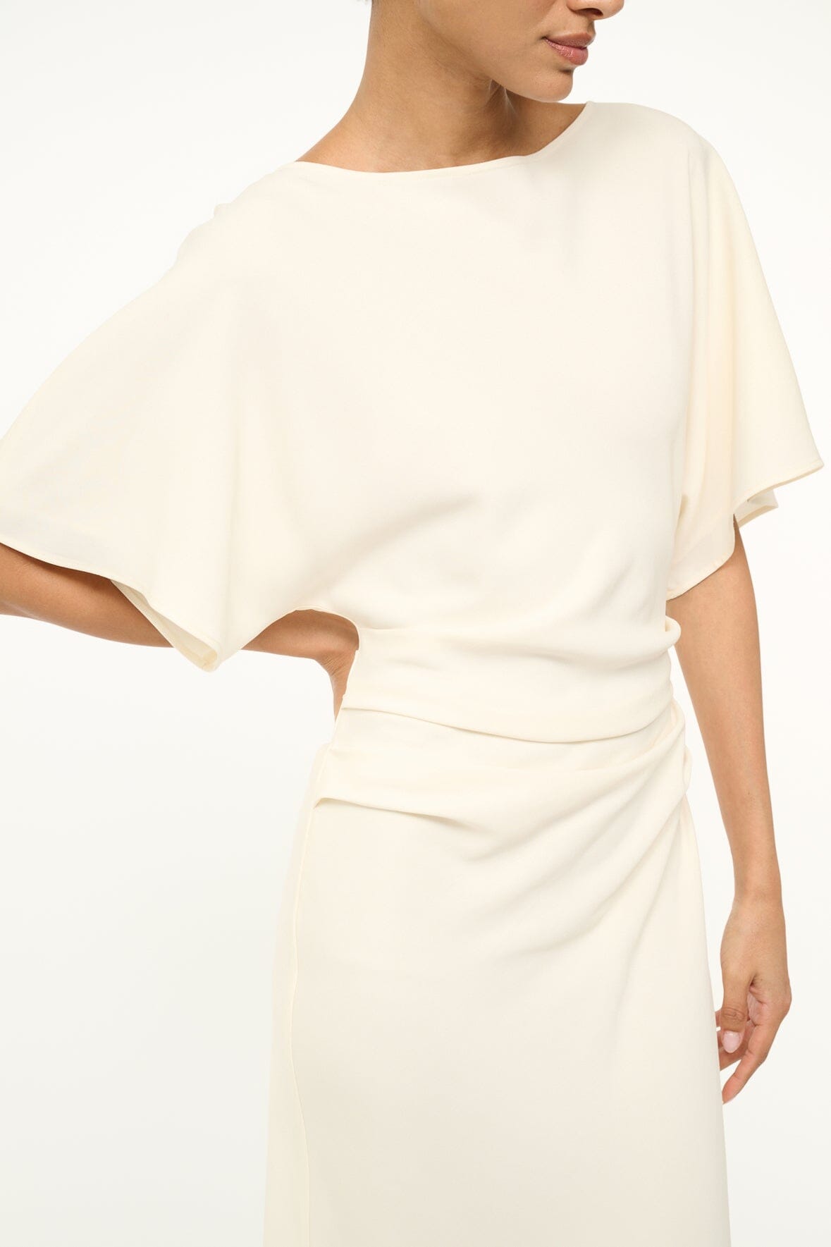 Ivory draped midi dress with boat neckline and short dolman sleeves