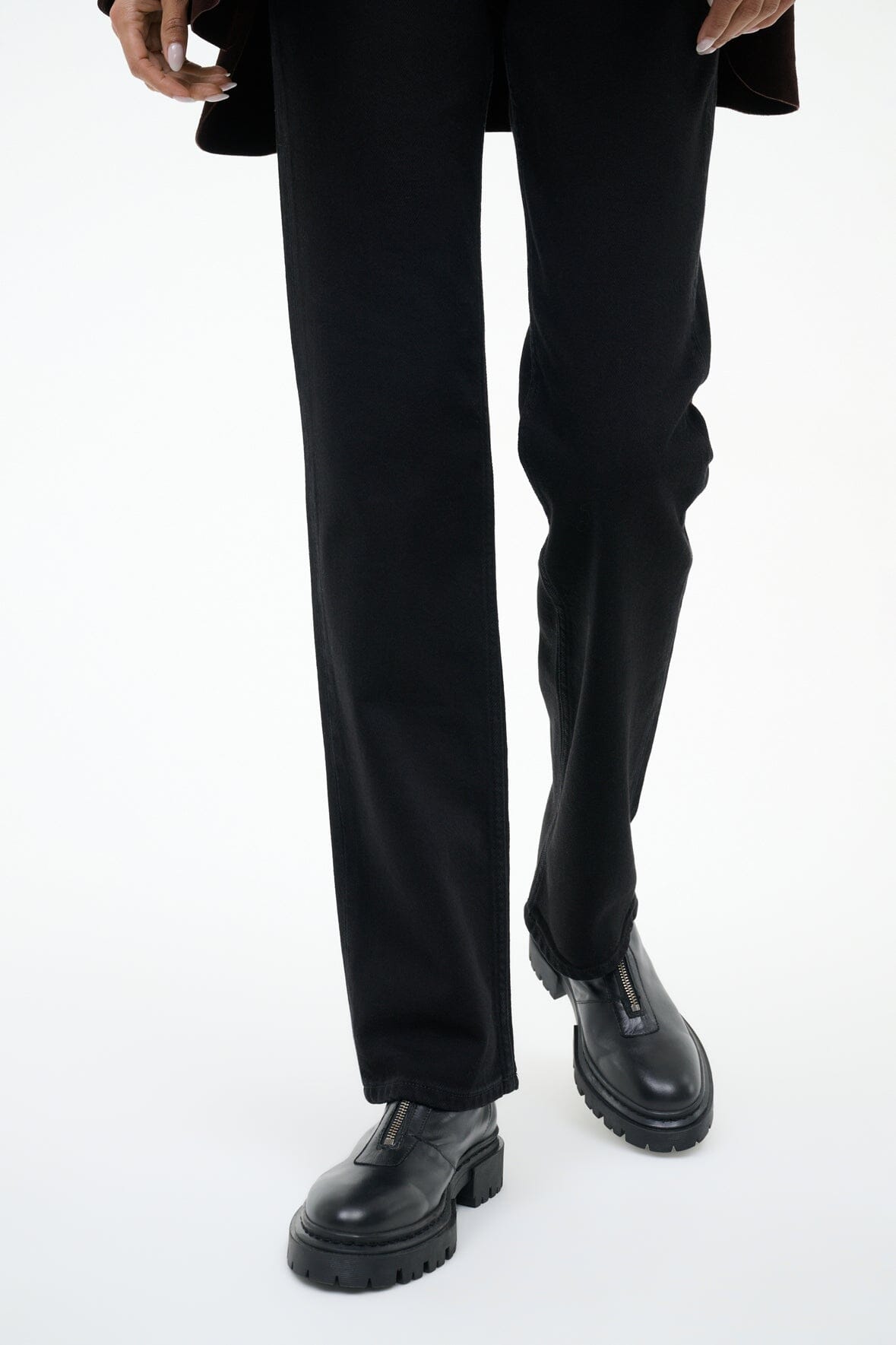 Black leather-look ankle boot with rounded toe and chunky lug sole