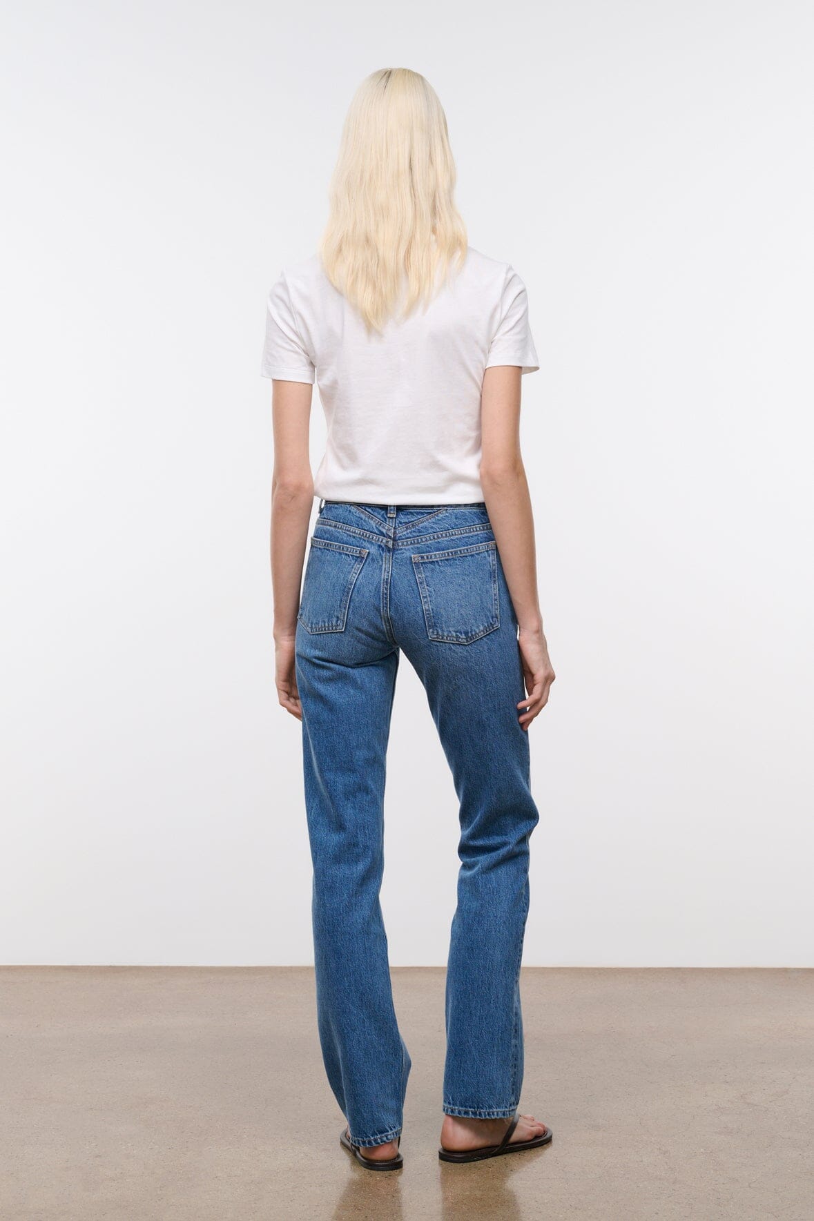Straight jeans in vintage wash, medium blue denim with back pockets and belt loops
