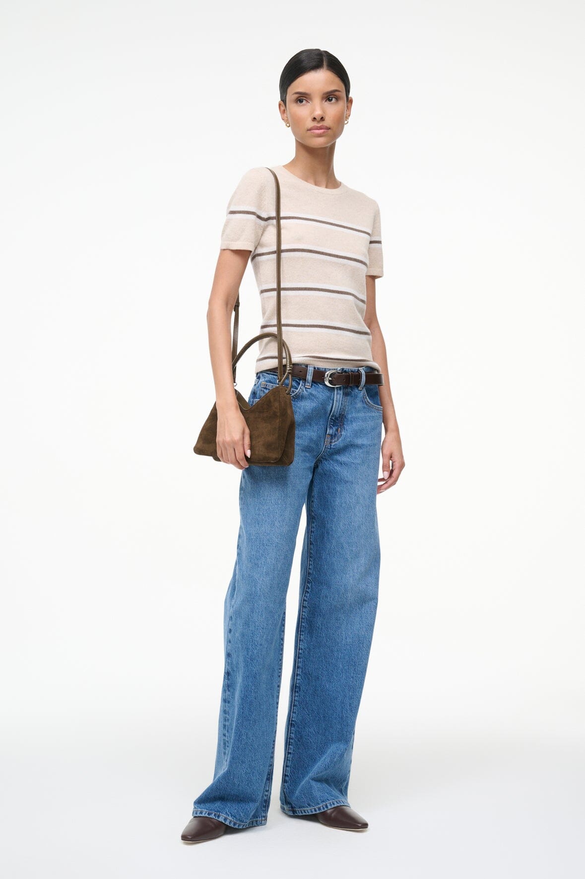 Truffle suede shoulder bag with short handles, carried at side