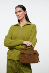 Cigar-brown suede mini carryall with oval logo patch and snap closure.