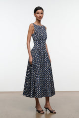 Sleeveless navy midi dress with allover yellow-dot abstract print and flared skirt