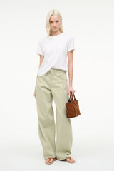 Tabac suede mini tote bag on model, compact shape with open top