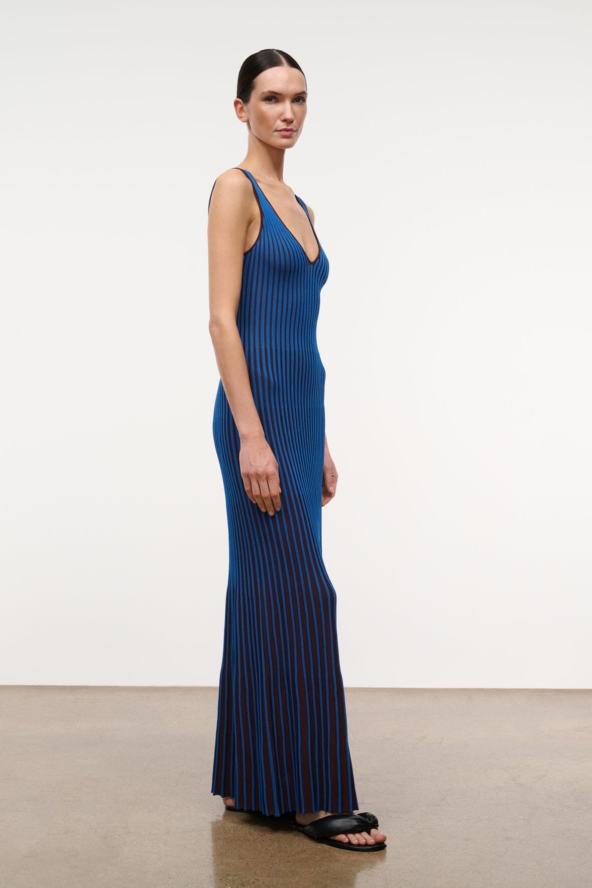Sleeveless V-neck maxi dress with vertical cobalt and dark stripes, front view