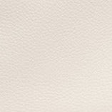 Cream leather bag material close-up with pebbled grain texture.