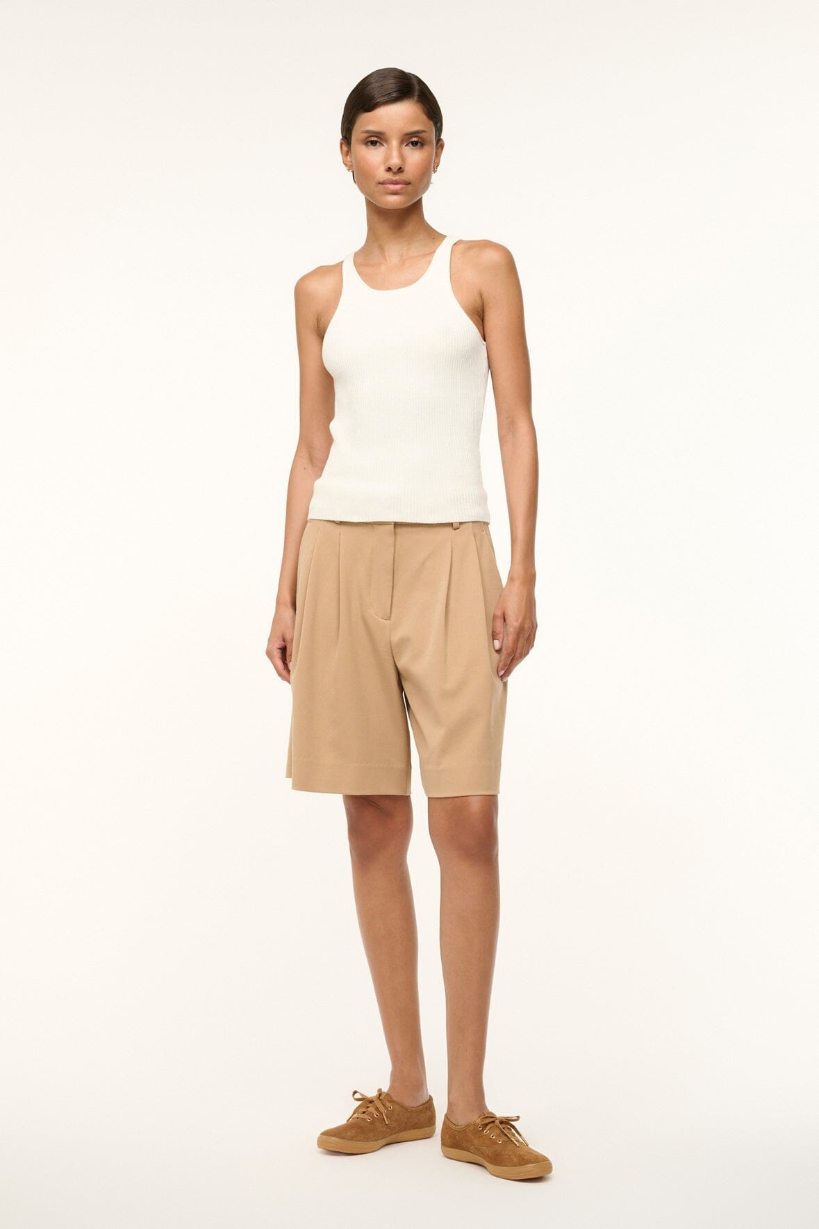 Women’s white sleeveless tank top with scoop neckline and straight hem