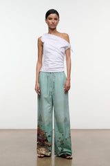 White one-shoulder draped sleeveless top with bow tie detail