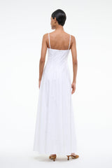 White maxi dress with spaghetti straps and open back, flowing pleated skirt
