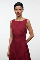 Burgundy sleeveless midi dress with round neckline and ruched waist