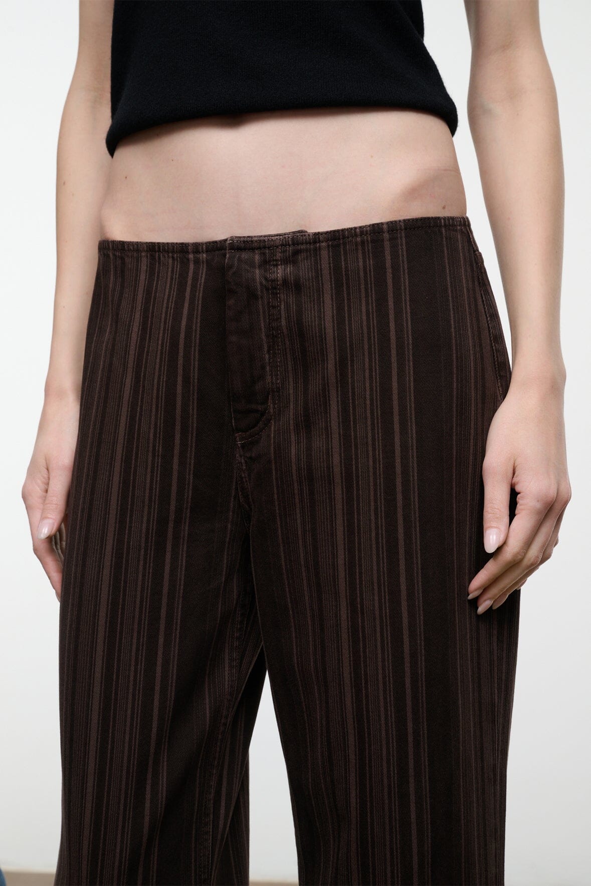 Women’s espresso-brown striped jeans with button fly and belt loops
