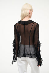 Black sheer ruffle back top with button detail and long layered sleeves