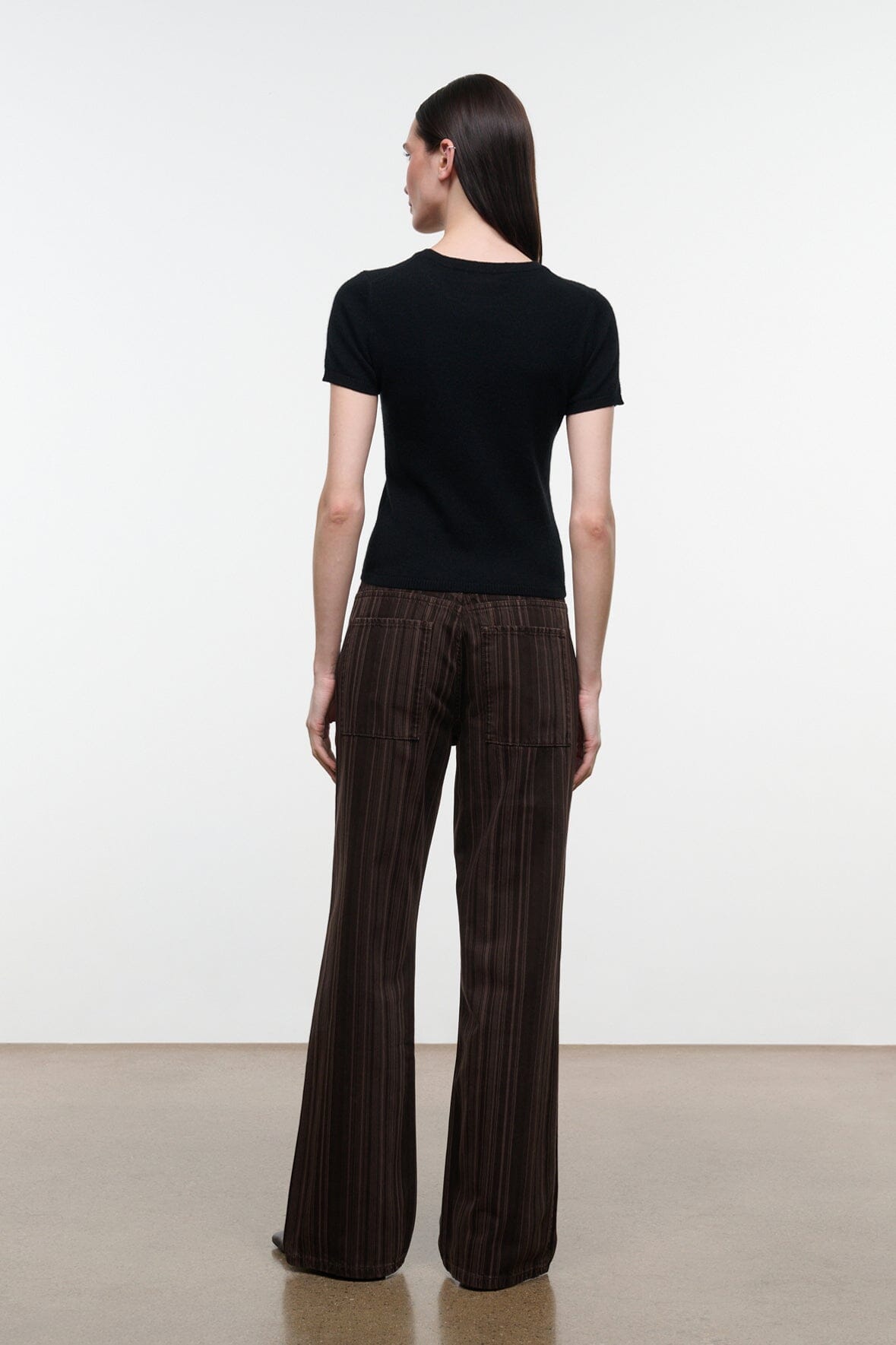Women’s espresso-brown striped jeans, back view with wide straight legs