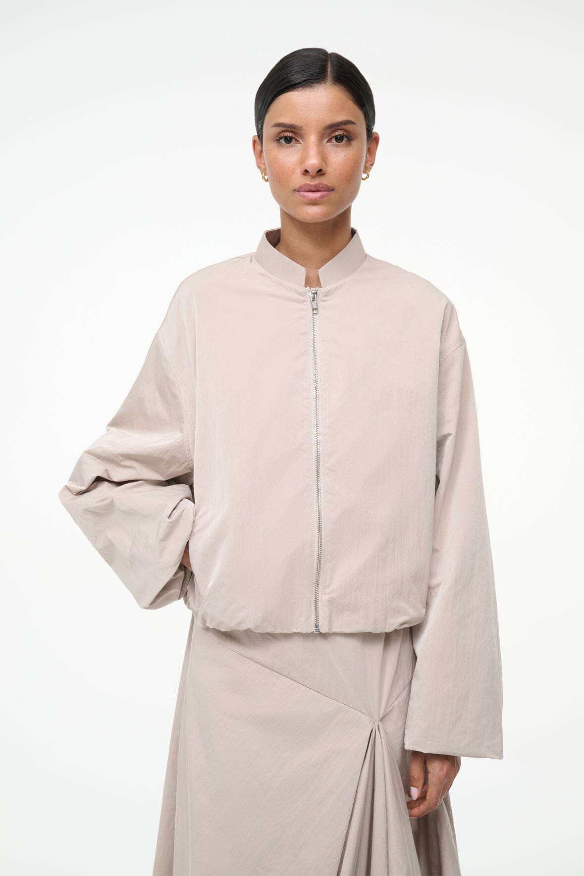 Fawn zip-front jacket with stand collar and gathered hem