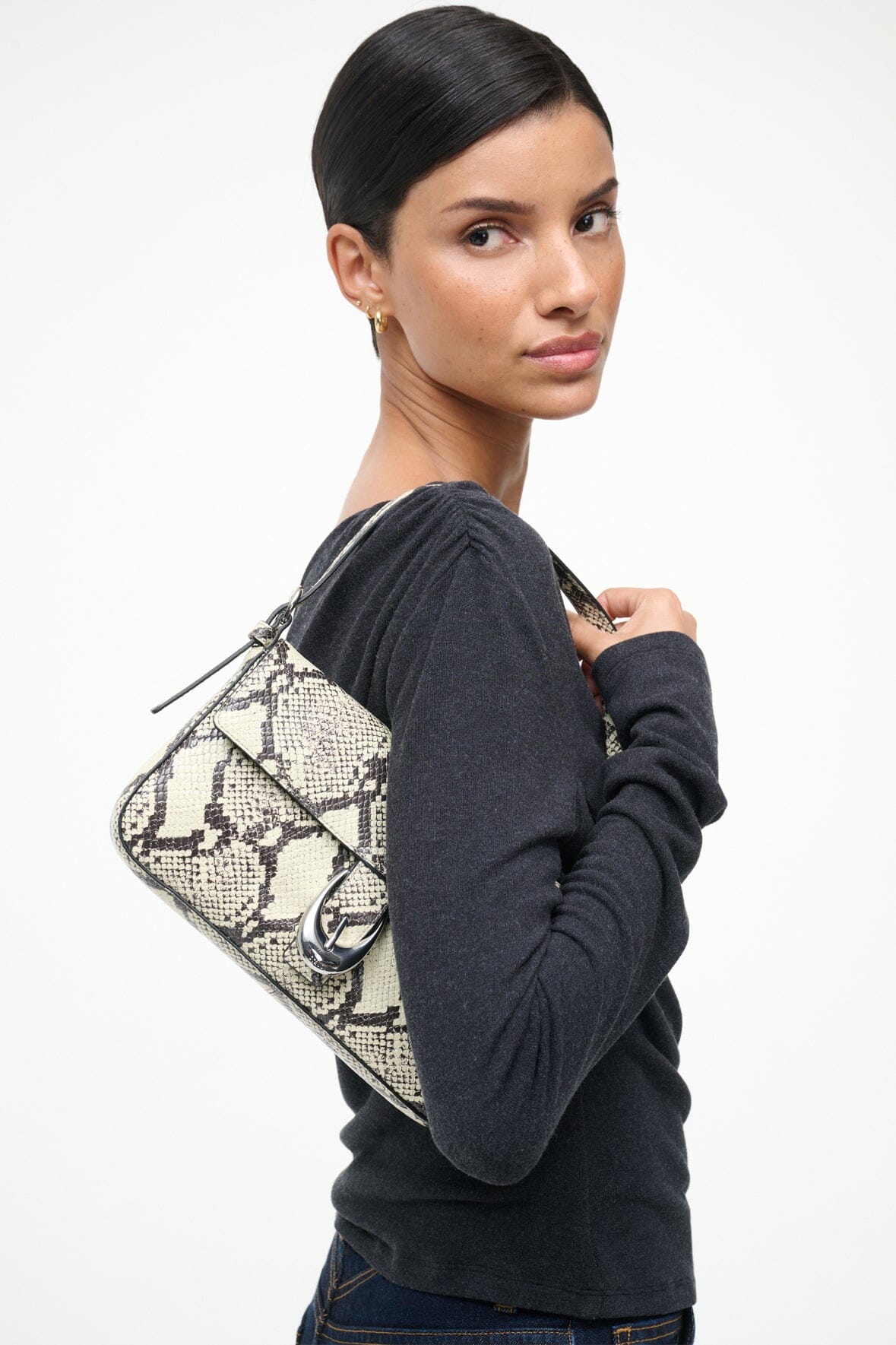 Harlow bag in white snake-print leather with top handle and flap clasp