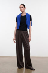 Dark oak wide-leg pants with elastic waistband and relaxed straight legs