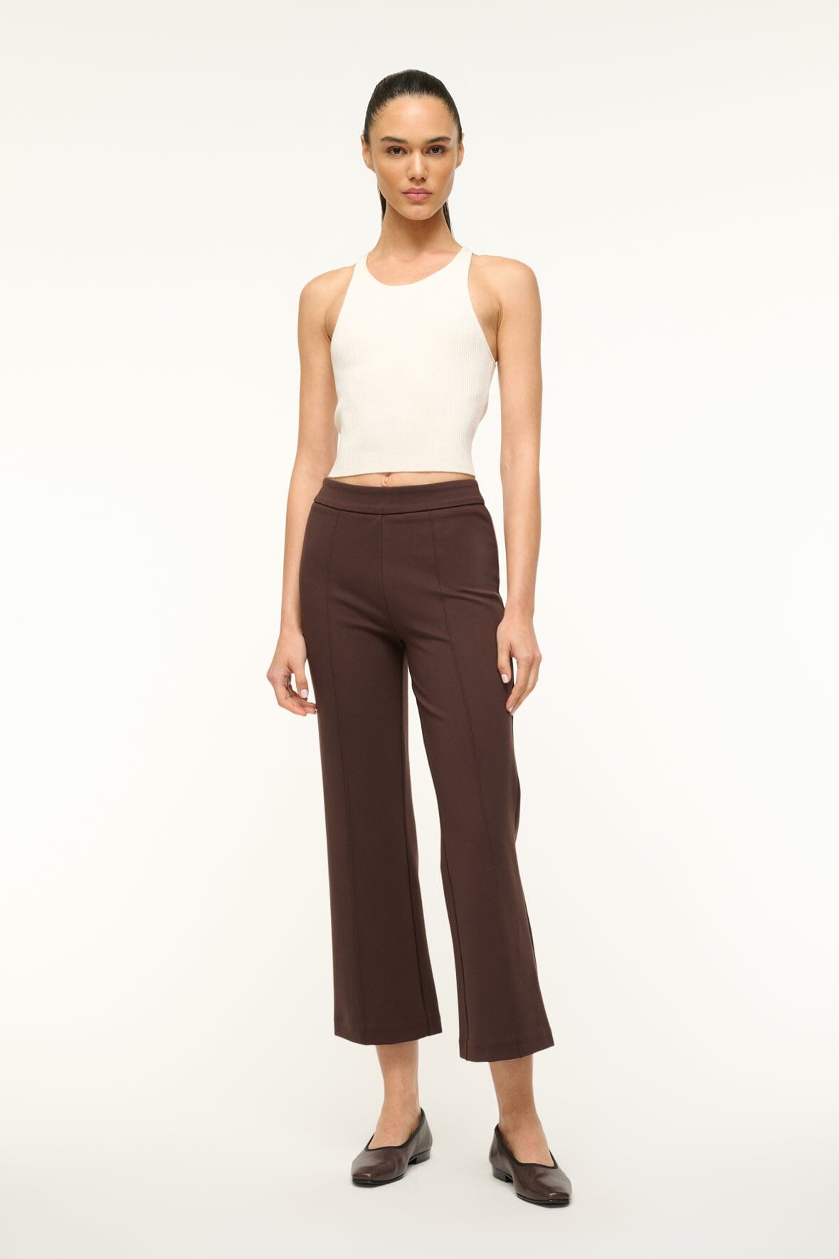 Women's dark chocolate brown wide-leg pants, front view with relaxed straight leg.