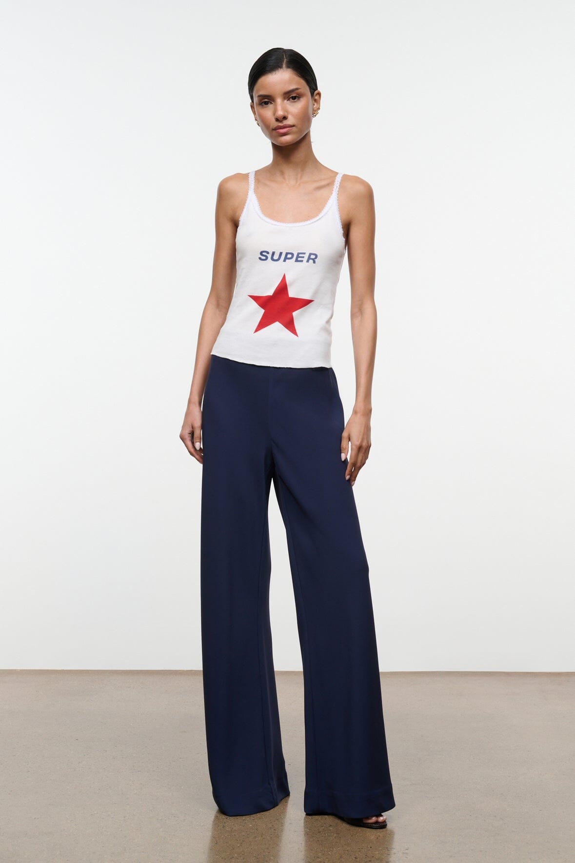 Navy wide-leg stroll pants with smooth front and wide hems